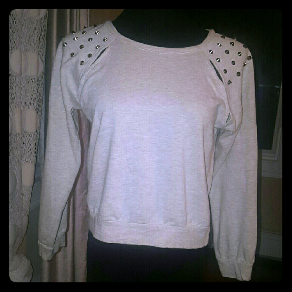 Spiked sweatshirt top with cutouts